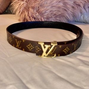 Louis Vuitton new belt with gold logo.